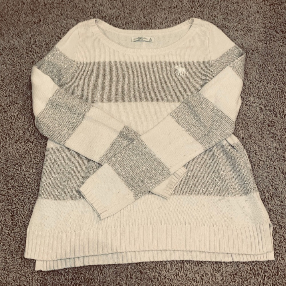 cream and gold sweater
